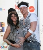 An expectant Melissa Rycroft and husband Tye Strickland