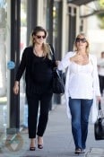 Ali Larter strolls with a friend