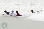 David Beckham boogie boards with his son Brooklyn, Romeo and Cruz