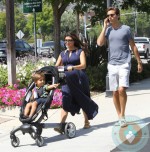 pregnant Kourtney Kardashian, Scott Disick,  Mason Disick in an Origami