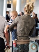 Kate Hudson Carries her son Bingham at Toronto International Airport