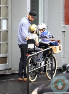 Liev Schreiber rides on a bike with his sons Sammy & Sasha