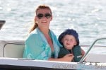 A pregnant Coleen Rooney, wife of Manchester United star Wayne Rooney, takes her son Kai out for some fun in the sun and sand in Barbados