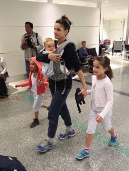 Amanda Peet travels with kids Molly, Frances and Henry Benioff