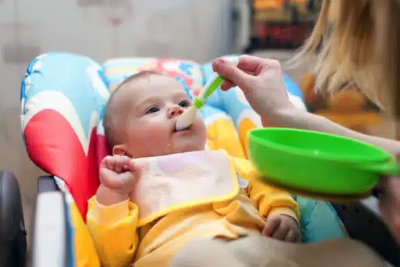 Baby Eating Solids 575x383 .webp