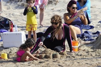 Mariah Carey at the beach with twins Moroccan and Monroe in Sardinia