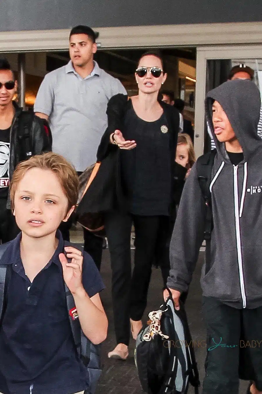 Angelina Jolie At LAX With Sons Maddox And Knox
