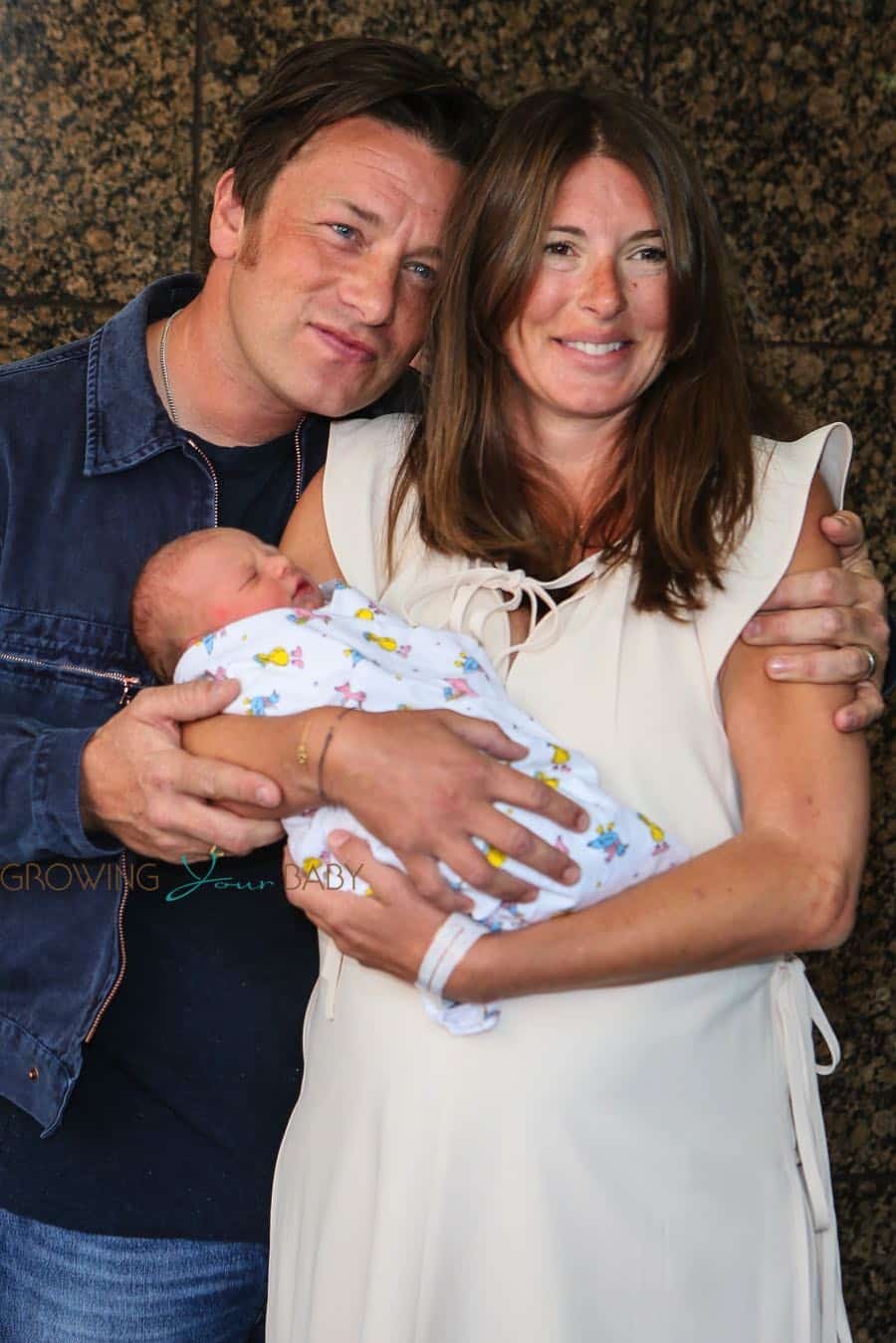 Jamie and Jules Oliver show off their baby boy outside the hospital ...
