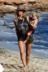 elsa-pataky-at-the-beach-in-spain-with-one-of-her-twins