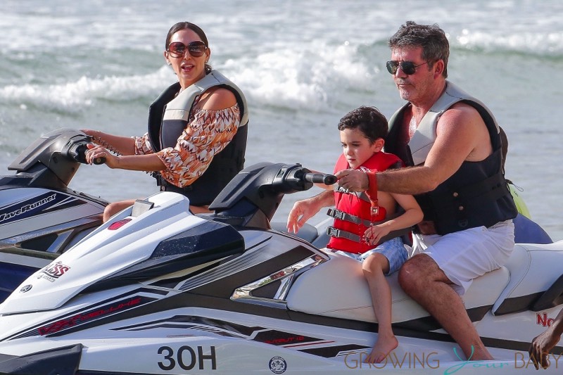 Simon Cowell And Lauren Silverman Jet Ski With Son Eric In Barbados