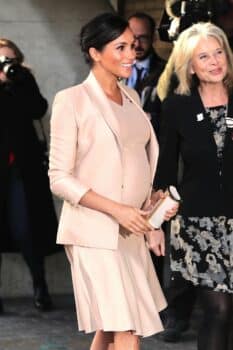 Pregnant Meghan Markle, Duchess of Sussex shows off her baby bump at the National Theatre in London