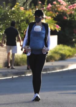 Katherine Schwarzenegger takes her baby girl out for an evening stroll