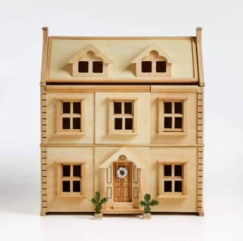 wooden victorian dollhouse with 2 floors and an attic