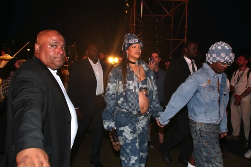 Pregnant Rihanna Bares Baby Bump While Attending Louis Vuitton