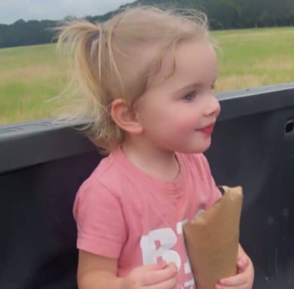 Jason Totens daughter sitting in their truck