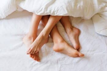 couple feet in bed
