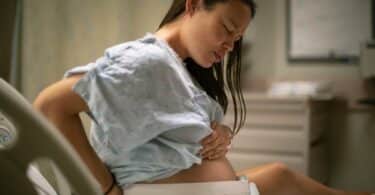 pregnant woman in the hospital delivery room having contractions Childbirth and labor