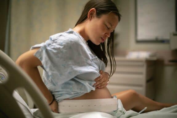 pregnant woman in the hospital delivery room having contractions Childbirth and labor