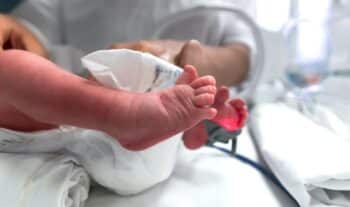 premature baby selective focus on his feet