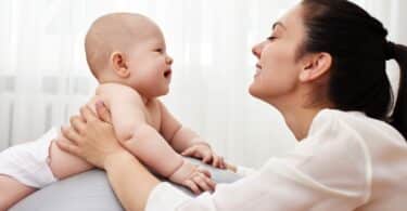 woman staring into babys eyes