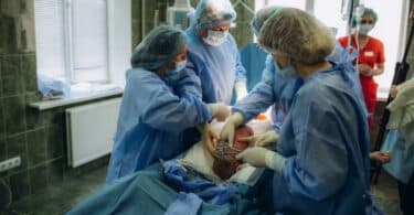 Baby being born via Caesarean Section