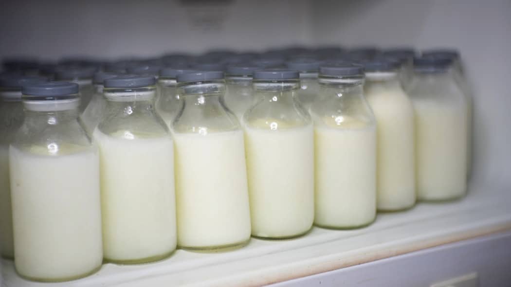 Frozen breast milk in the bottles