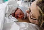 Mother with newborn baby just finished giving birth