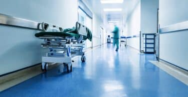 Doctors or nurses walking in hospital hallway