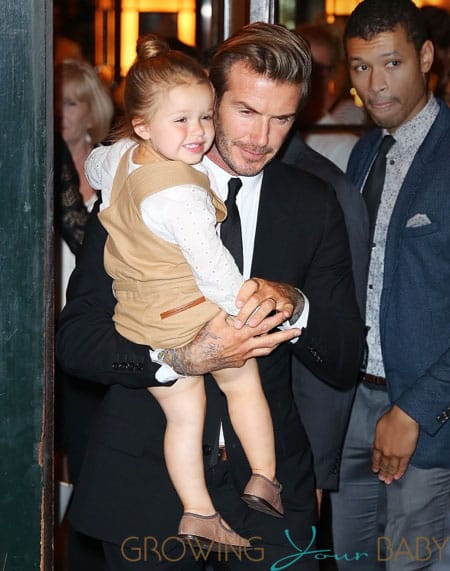 Harper is all smiles when coming out with daddy David Beckham and ...