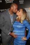 Kendra Wilkinson & husband Hank Baskett red carpet Hunger Games premiere