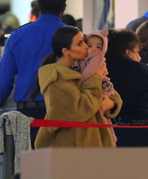 Kim Kardashian & Kris Jenner Check in At JFK With Baby North