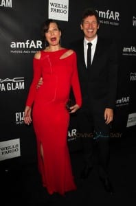 Pregnant Milla Jovovich and husband Paul WS Anderson at the amfAR LA Inspiration Gala Honoring Tom Ford