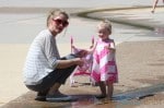 Eric Dane gets a visit from wife Rebecca Gayheart and their daughters Billie and Georgia, during a training session at a Los Angeles park